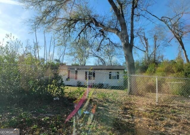 3505 Jack Kelly Road Augusta, GA 30906 - Photo 1 of 3 a backyard of a house with lots of green space