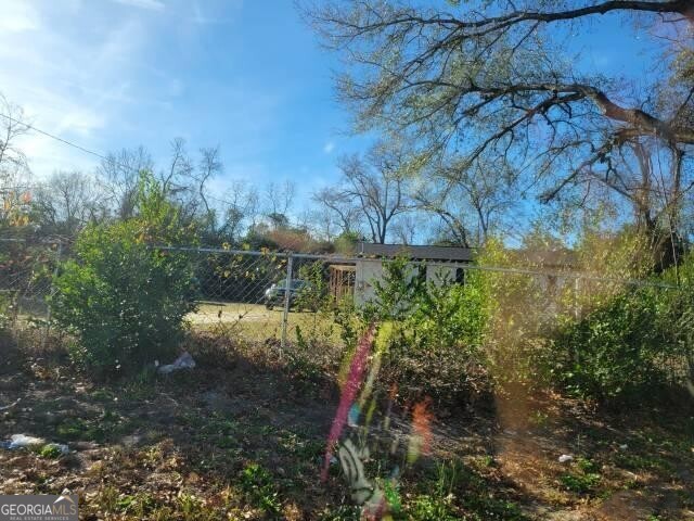 3505 Jack Kelly Road Augusta, GA 30906 - Photo 2 of 3 a backyard of a house with lots of green space