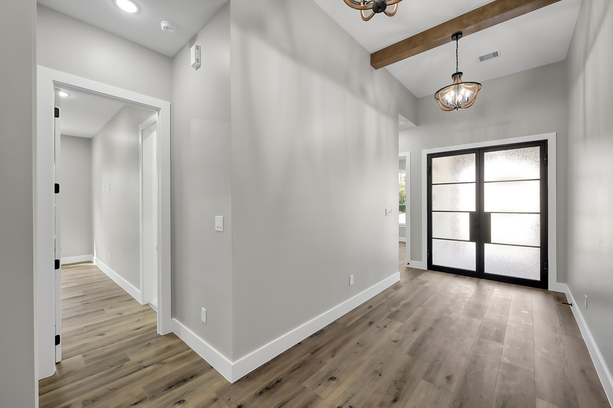 135 Wick Willow Road Montgomery, TX 77356 - Photo 6 of 48 wooden floor in an empty room with a window