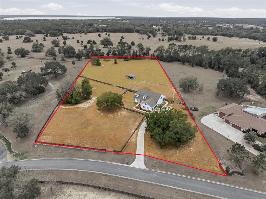 5608 Strong Point Weirsdale, FL 32195 - Photo 12 of 56 an aerial view of a house
