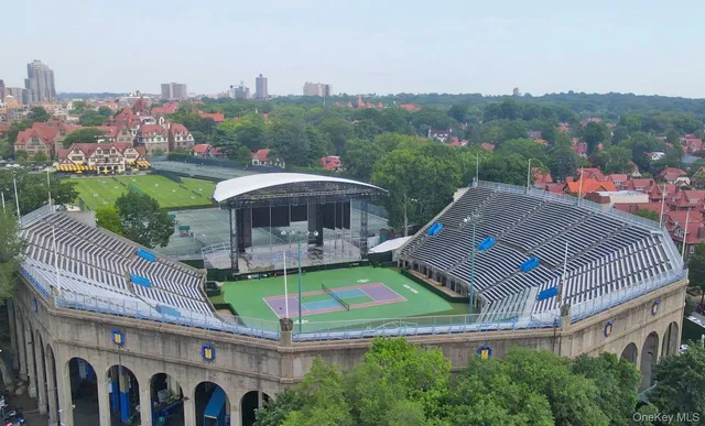 a view of a big building next to a big yard
