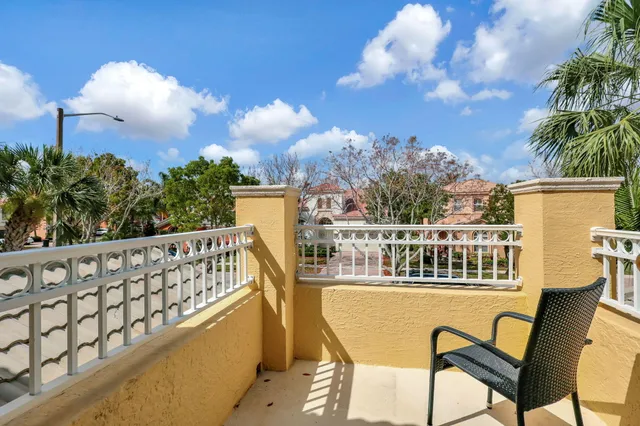a view of a chairs and table on the terrace