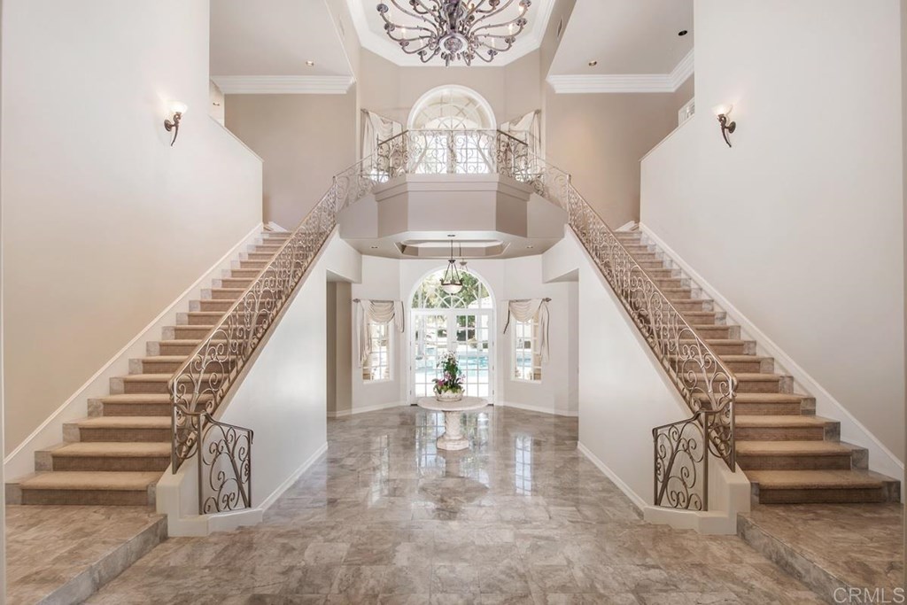 17101 Circa Oriente Rancho Santa Fe, CA 92067 - Photo 13 of 23 a view of entryway and hall with wooden floor