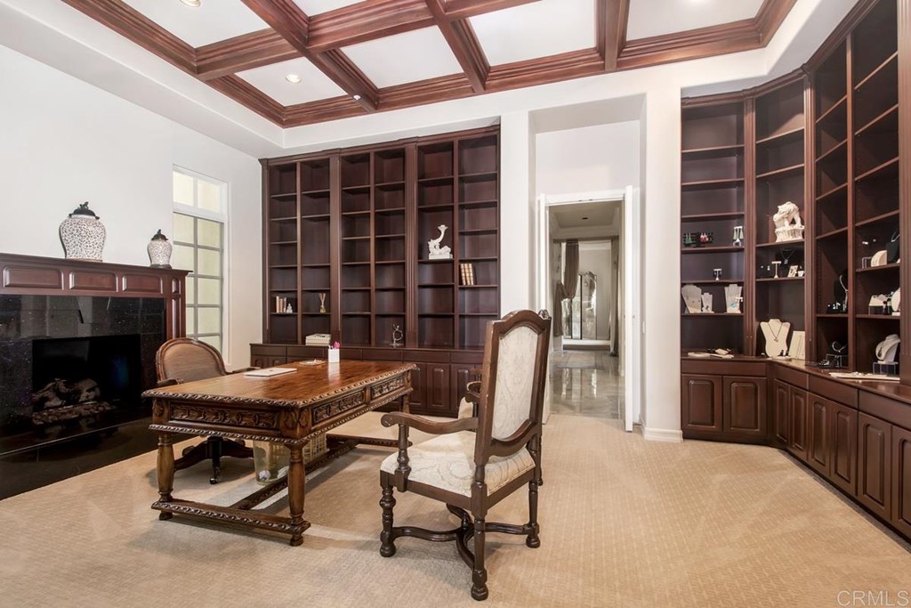 17101 Circa Oriente Rancho Santa Fe, CA 92067 - Photo 20 of 23 a view of a workspace with furniture and a fireplace