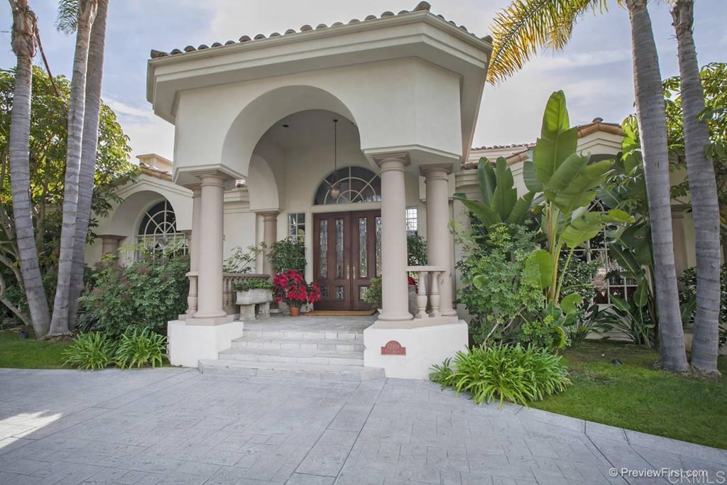17101 Circa Oriente Rancho Santa Fe, CA 92067 - Photo 2 of 23 a front view of a house