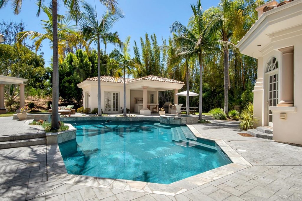 17101 Circa Oriente Rancho Santa Fe, CA 92067 - Photo 21 of 23 a view of a patio with swimming pool table and chairs