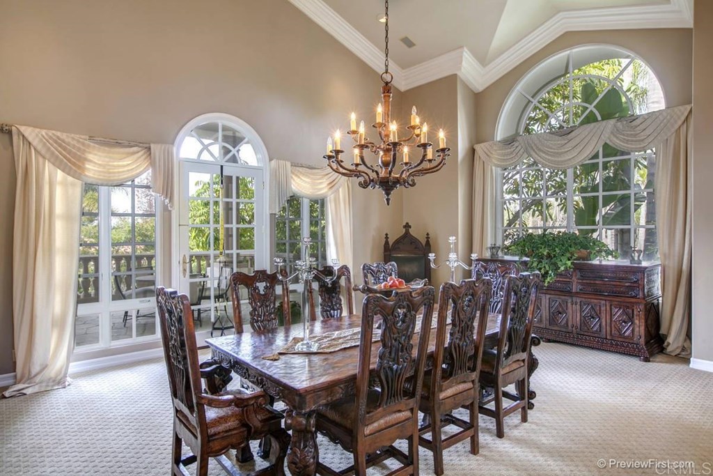 17101 Circa Oriente Rancho Santa Fe, CA 92067 - Photo 4 of 23 a view of a dining room with furniture window and outside view