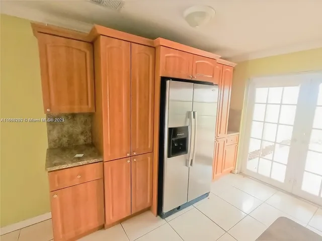 a walk in closet with window