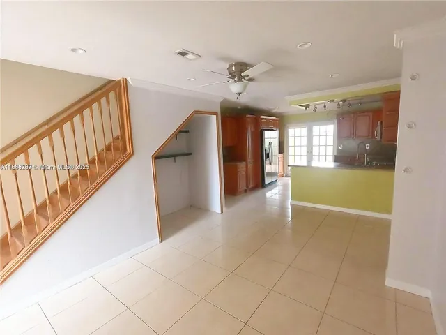 a view of a hallway with an entryway