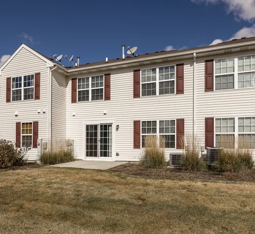 a front view of a house with windows