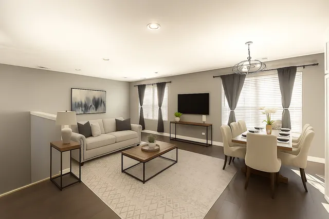 a living room with furniture a flat screen tv and a large window