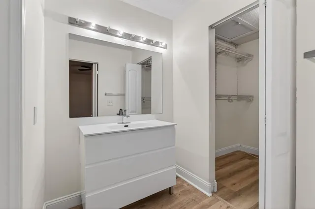 a bathroom with a shower and a toilet