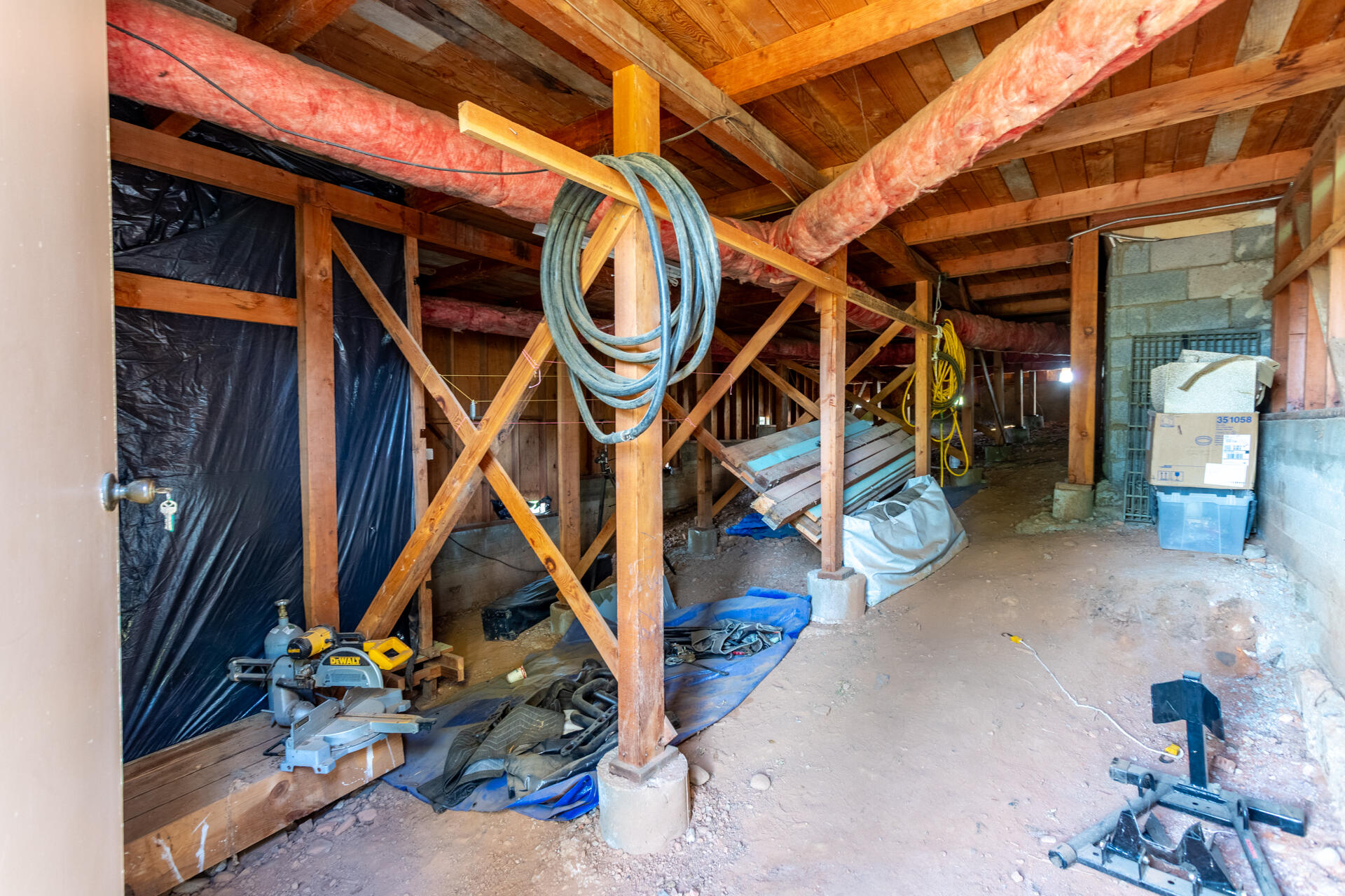 8818 Valley View Road Redding, CA 96001 - Photo 21 of 37 a view of a room with rack and wooden walls