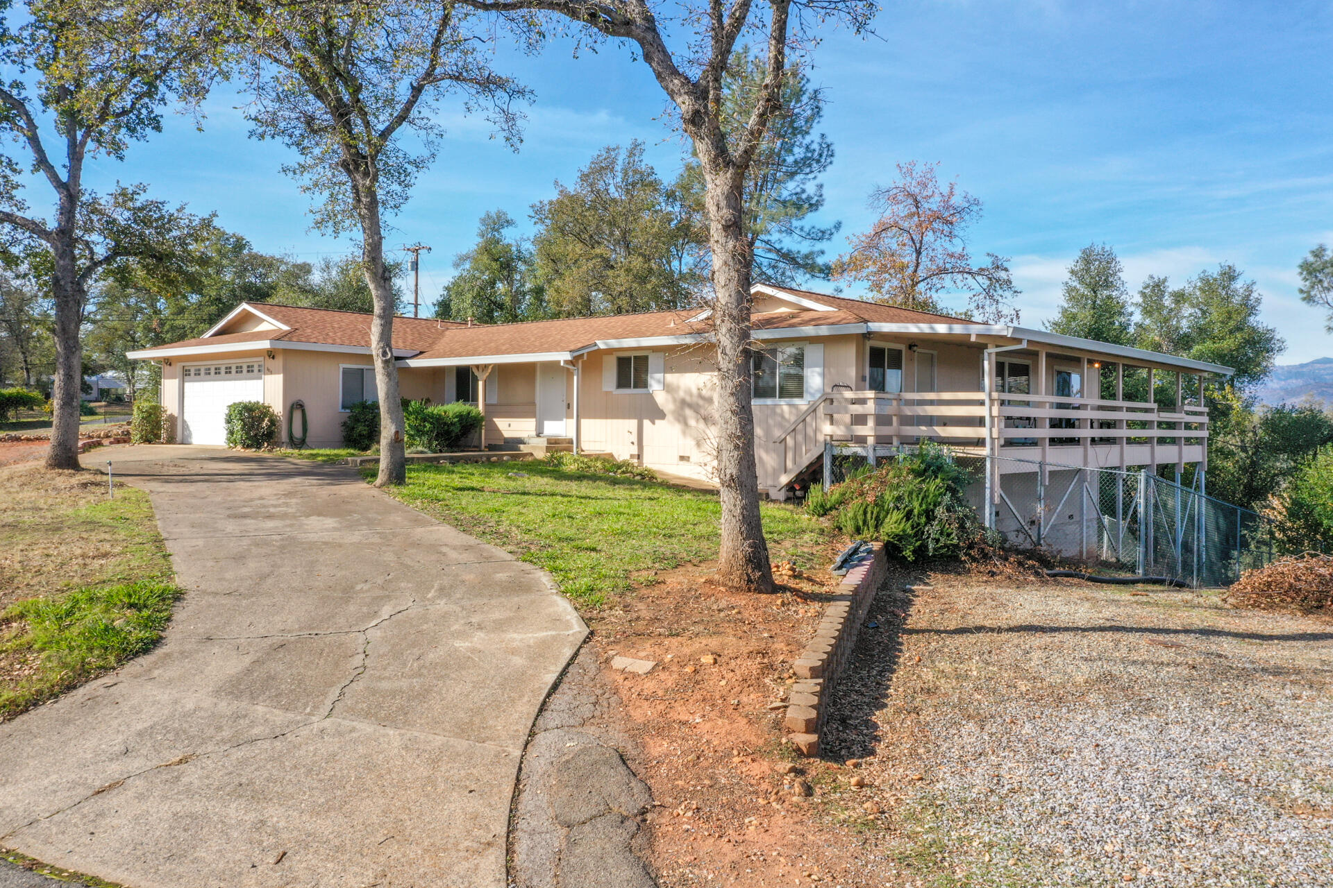 8818 Valley View Road Redding, CA 96001 - Photo 33 of 37 front view of a house with a yard