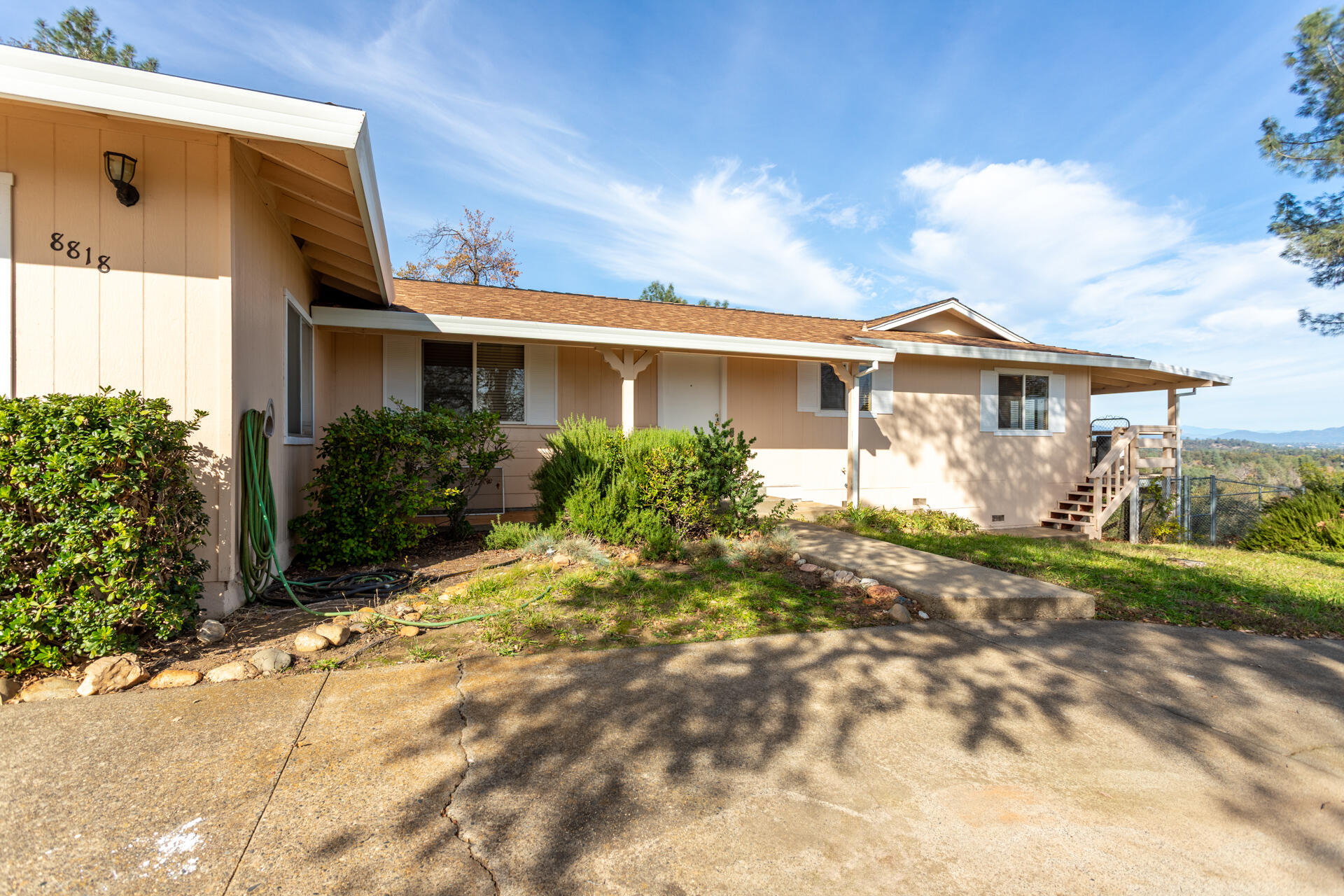 8818 Valley View Road Redding, CA 96001 - Photo 35 of 37 a view of a house with a yard