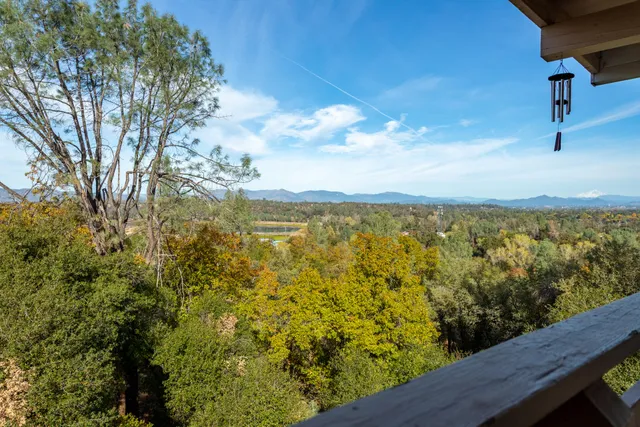 a view of a lake from a balcony