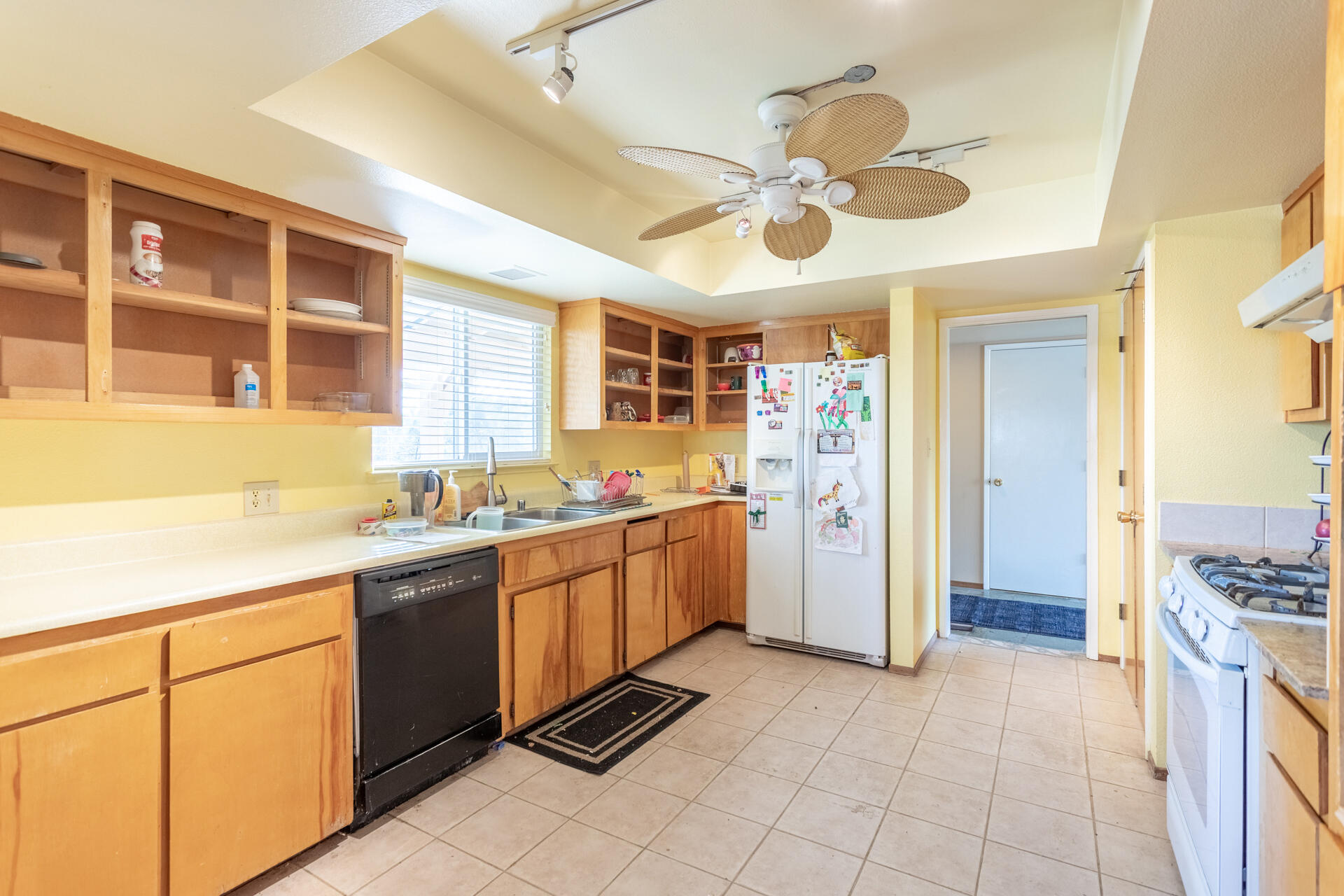 8818 Valley View Road Redding, CA 96001 - Photo 6 of 37 a kitchen with a cabinets and chandelier