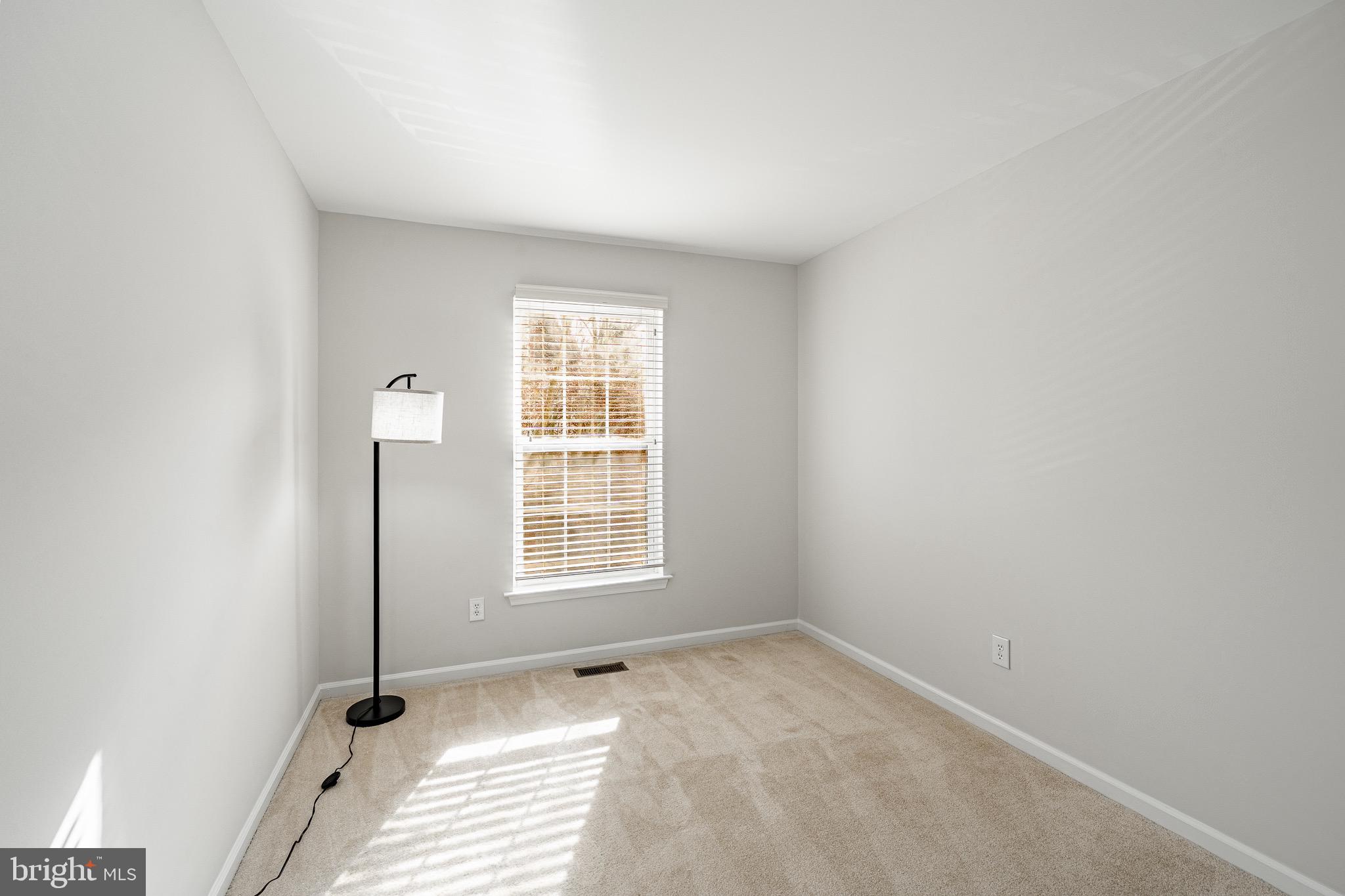 1406 Harbour Ridge Lane Downingtown, PA 19335 - Photo 20 of 57 an empty room with windows
