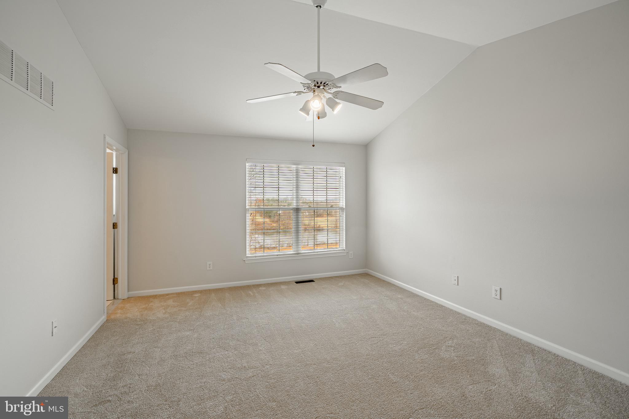1406 Harbour Ridge Lane Downingtown, PA 19335 - Photo 25 of 57 a view of an empty room with a window