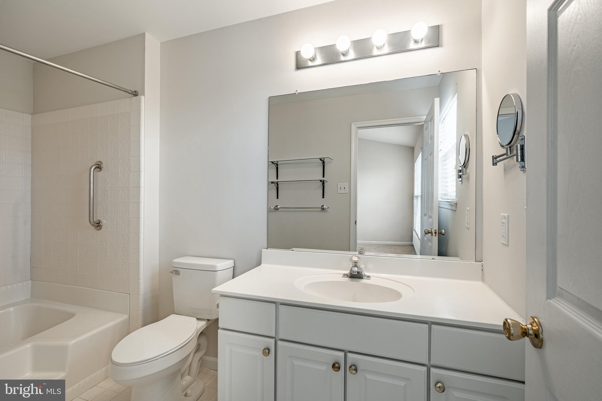 1406 Harbour Ridge Lane Downingtown, PA 19335 - Photo 29 of 57 a bathroom with a sink toilet vanity and shower
