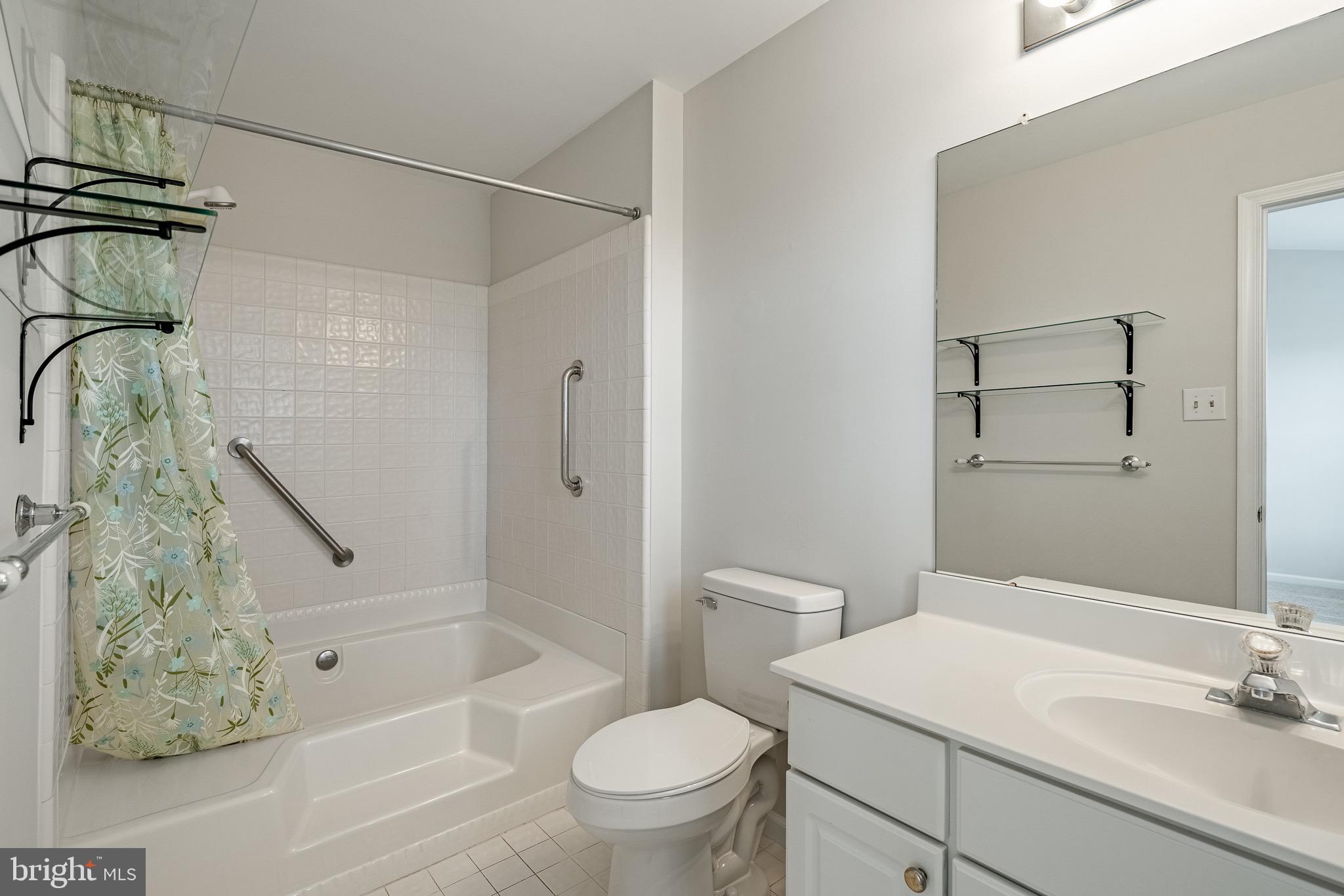 1406 Harbour Ridge Lane Downingtown, PA 19335 - Photo 30 of 57 a bathroom with a sink a toilet and shower