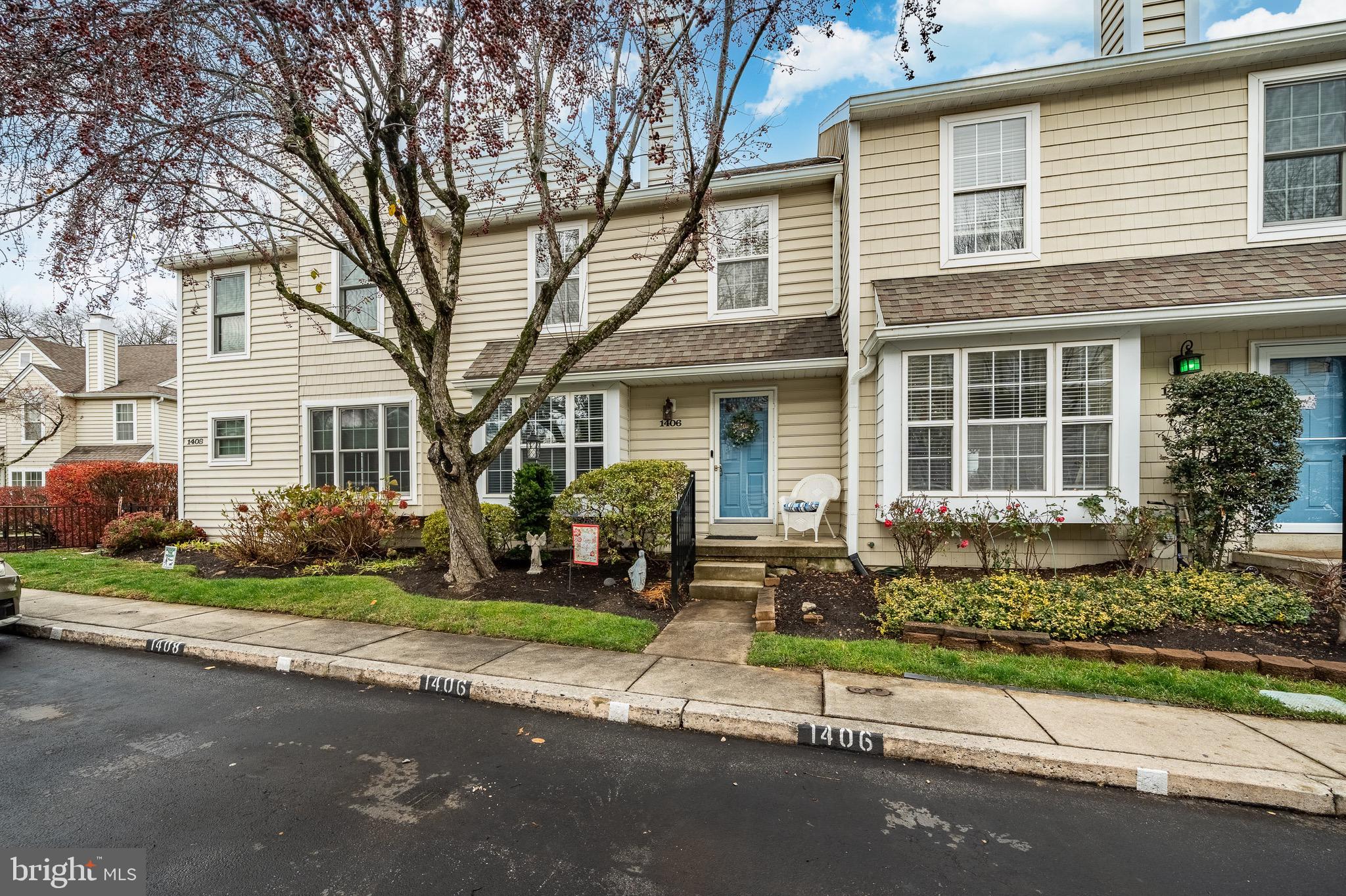 1406 Harbour Ridge Lane Downingtown, PA 19335 - Photo 3 of 57 front view of a house with a yard