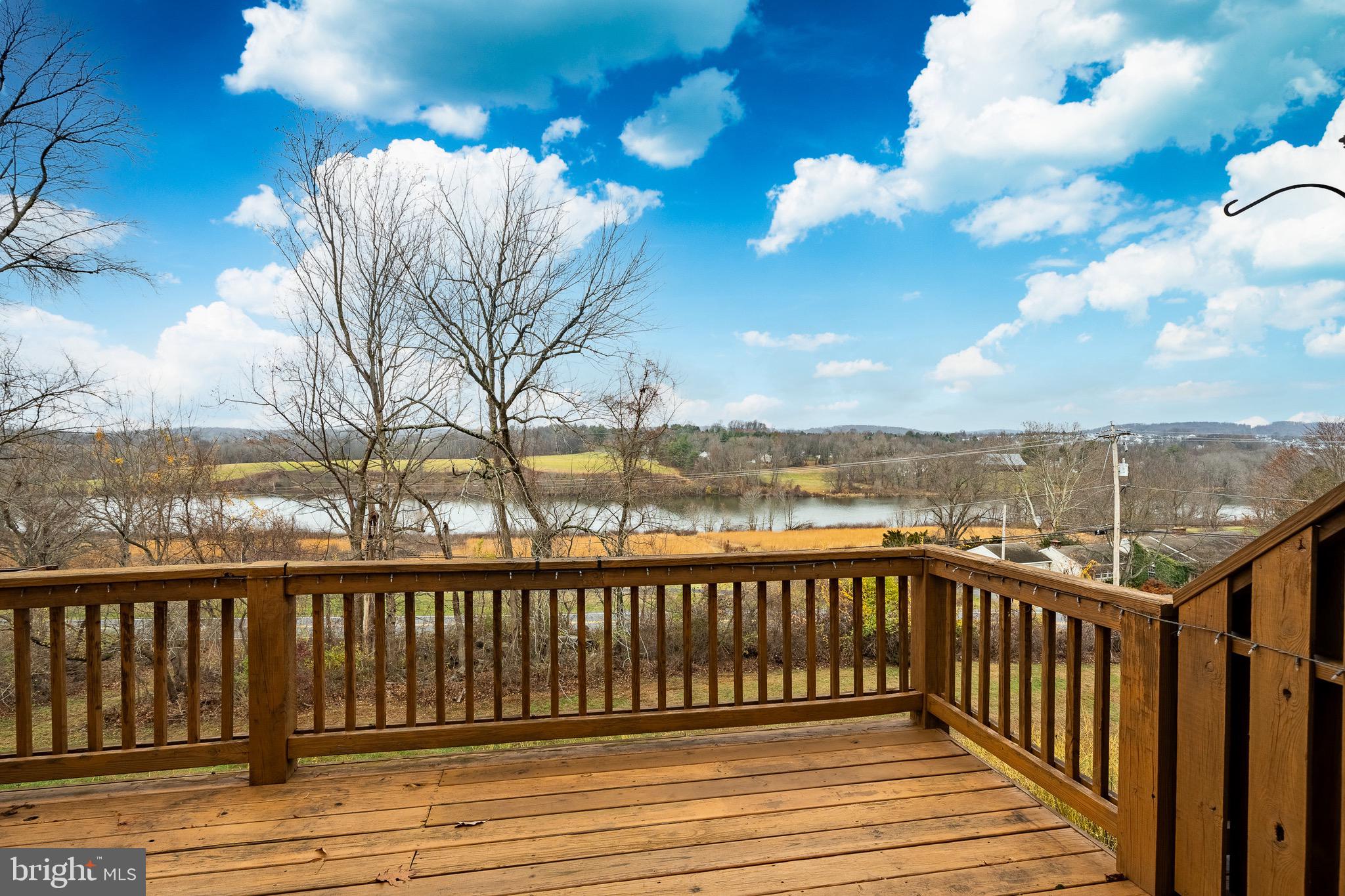 1406 Harbour Ridge Lane Downingtown, PA 19335 - Photo 34 of 57 a view of a balcony with wooden floor