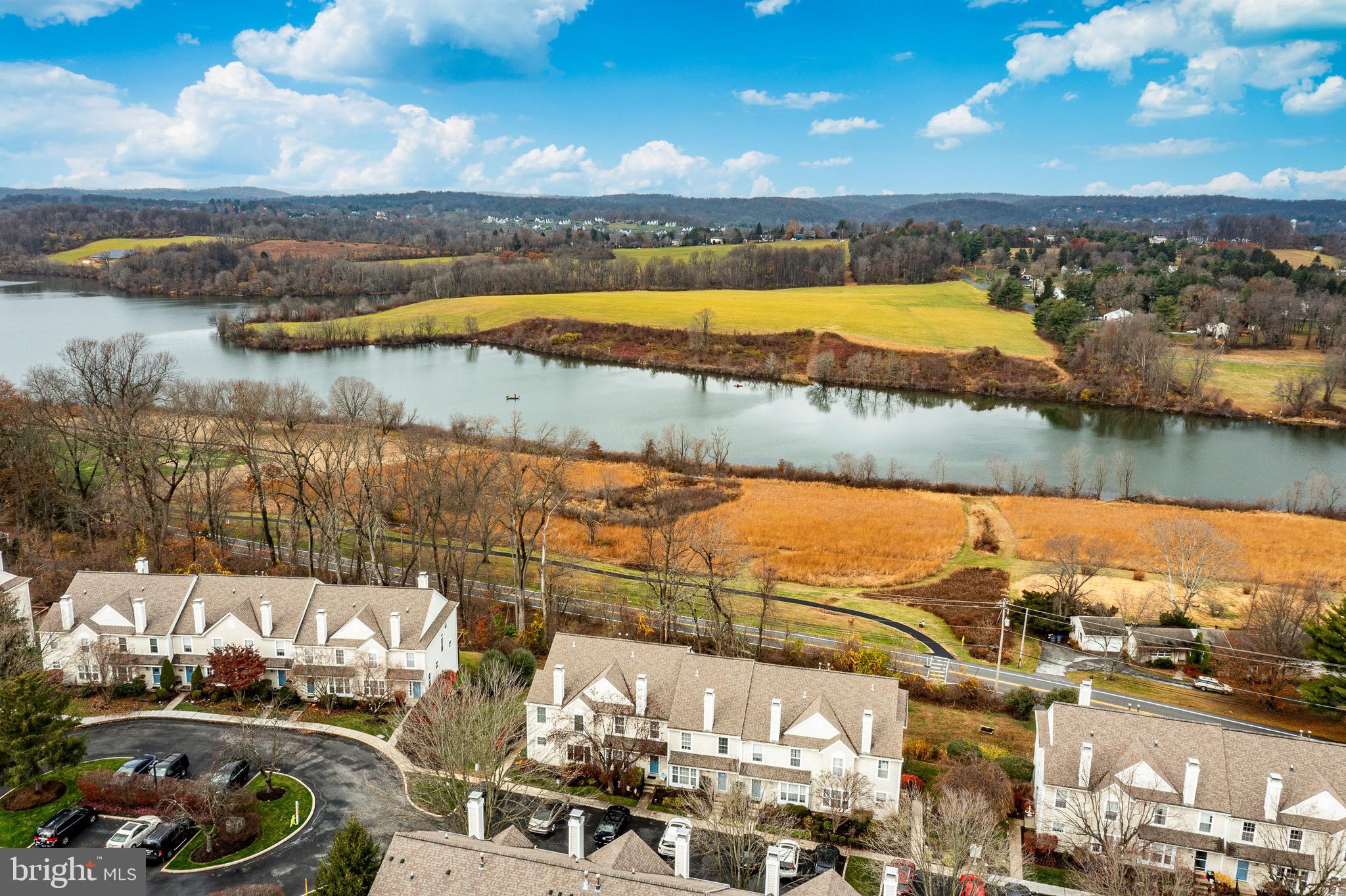 1406 Harbour Ridge Lane Downingtown, PA 19335 - Photo 42 of 57 a view of a lake with a city