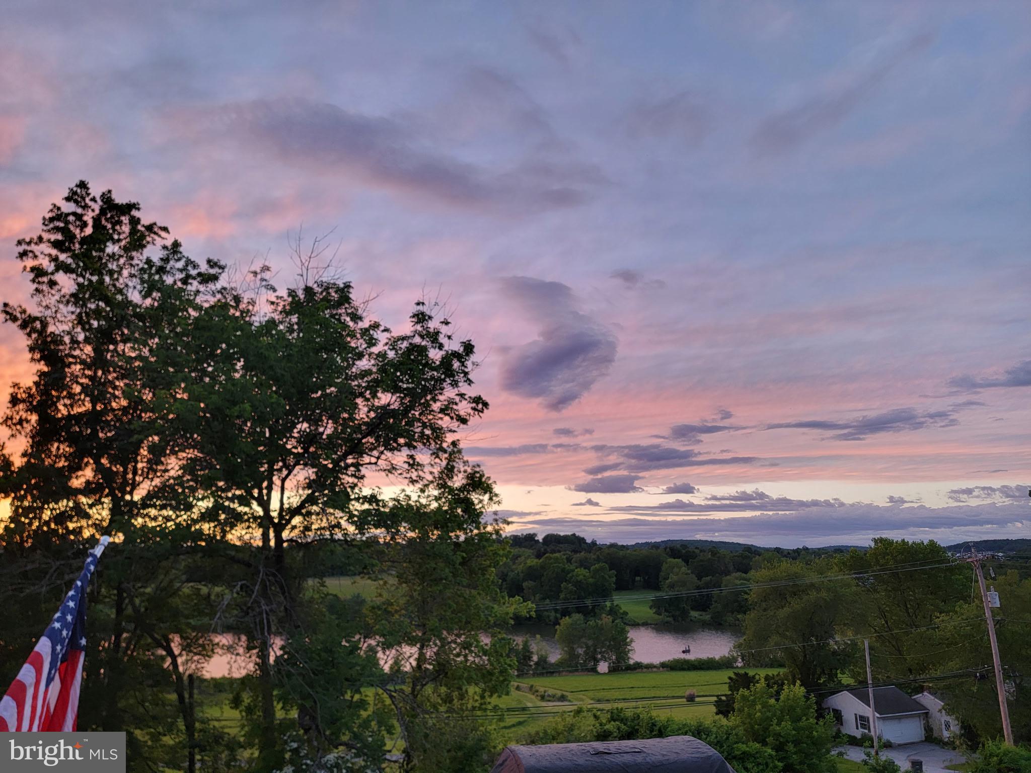 1406 Harbour Ridge Lane Downingtown, PA 19335 - Photo 56 of 57 a view of a city with green space and a garden