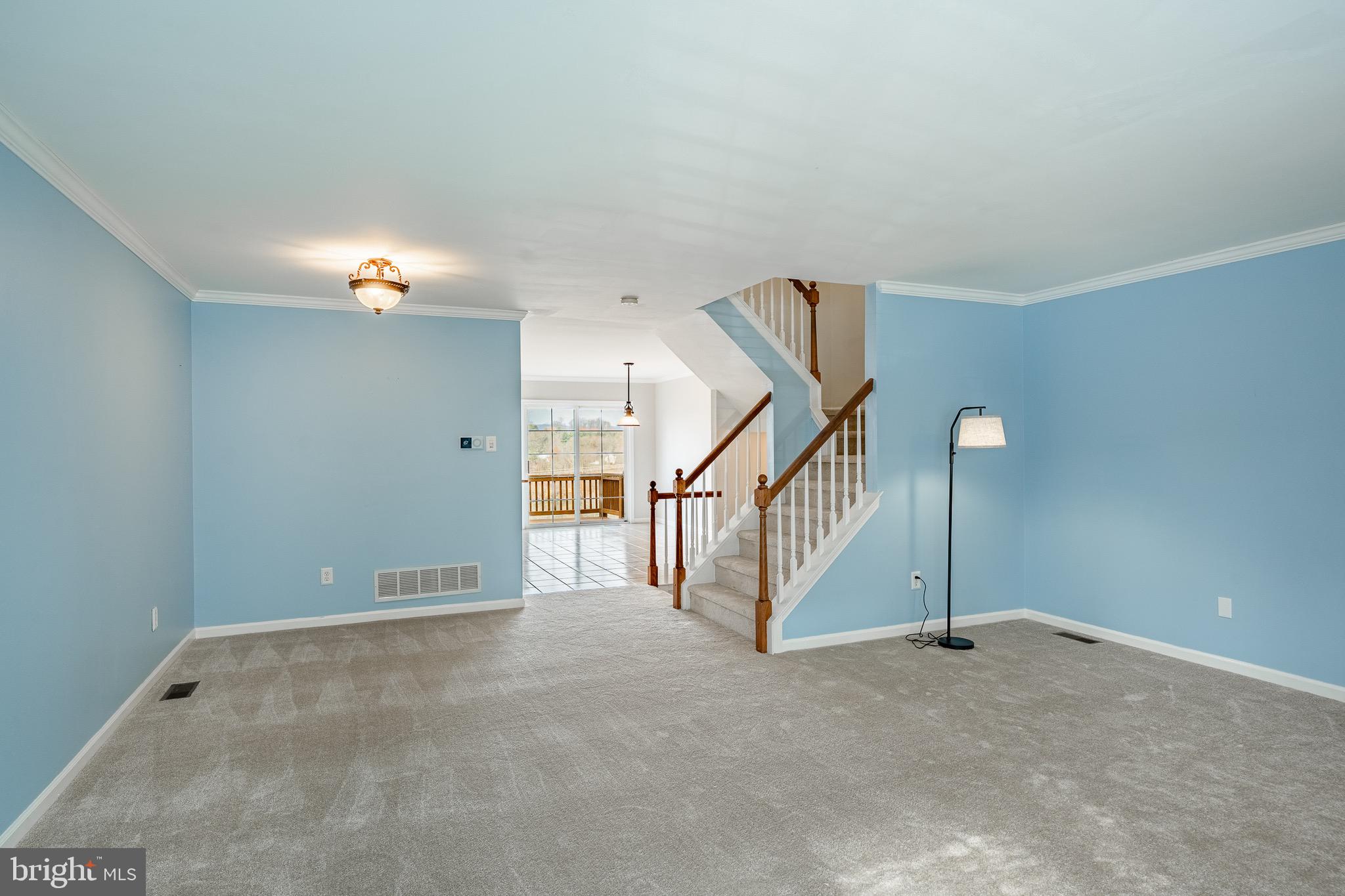 1406 Harbour Ridge Lane Downingtown, PA 19335 - Photo 6 of 57 a view of an empty room with stairs