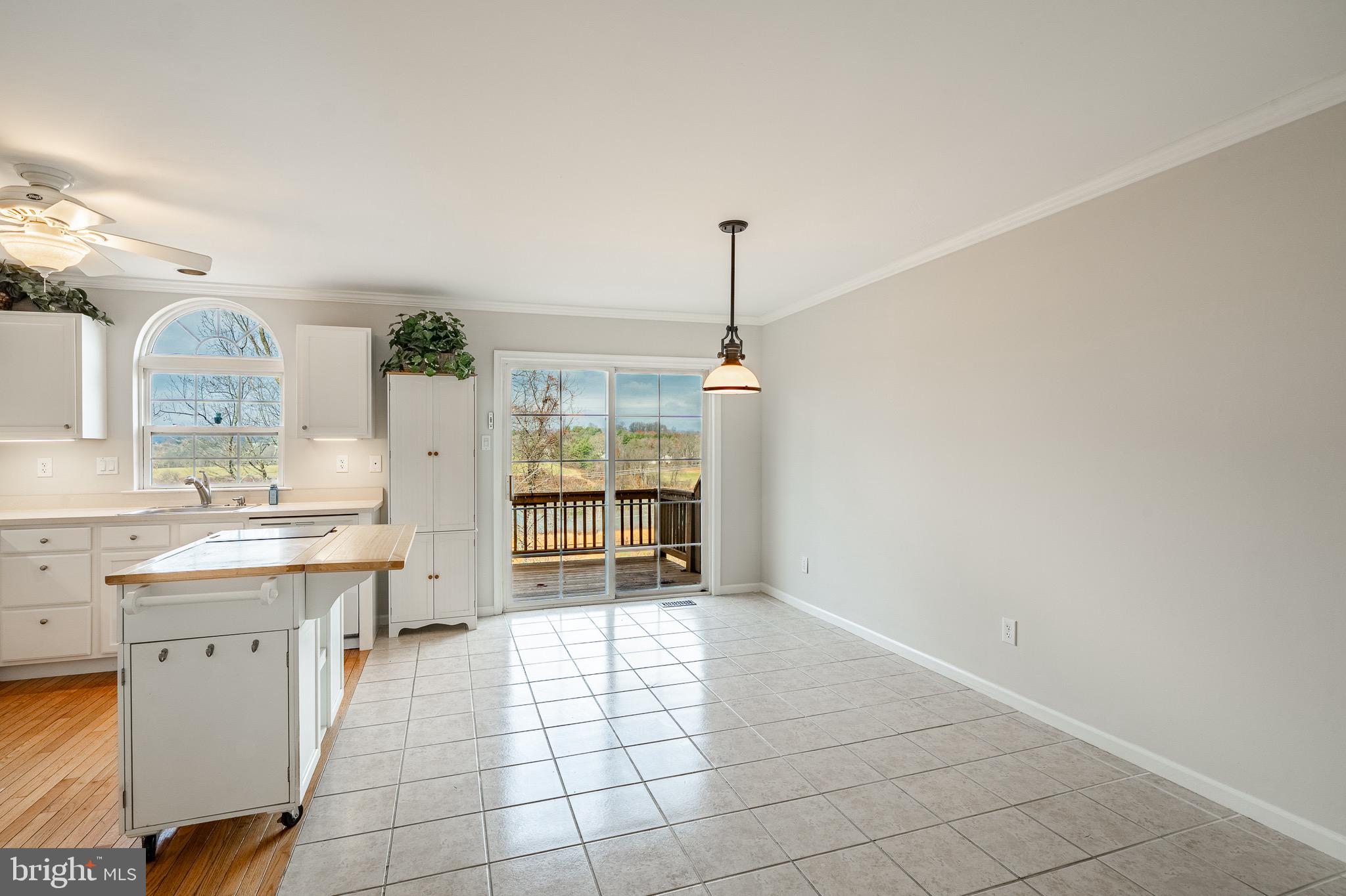 1406 Harbour Ridge Lane Downingtown, PA 19335 - Photo 10 of 57 a kitchen with stainless steel appliances a refrigerator and a stove top oven