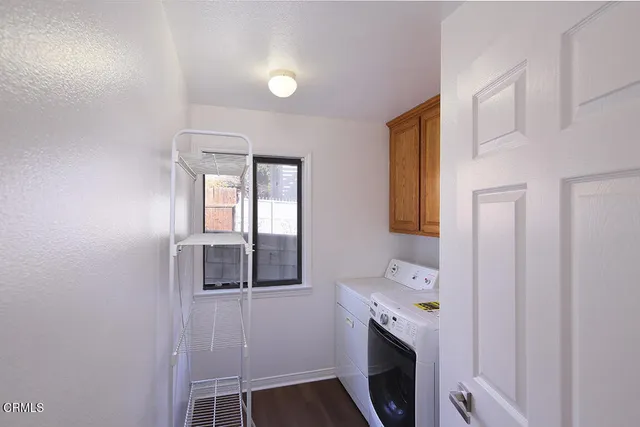 a bathroom with a window and a fireplace