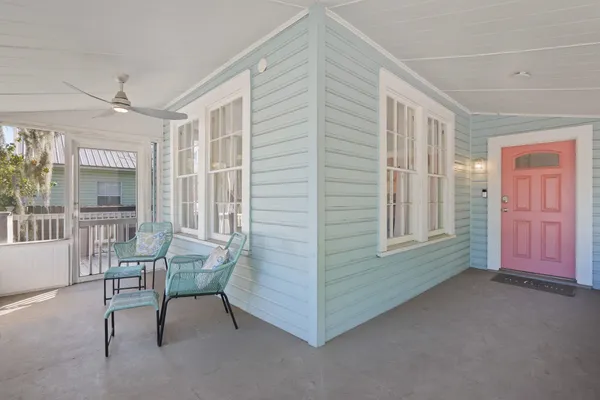 a view of a livingroom with furniture and windows