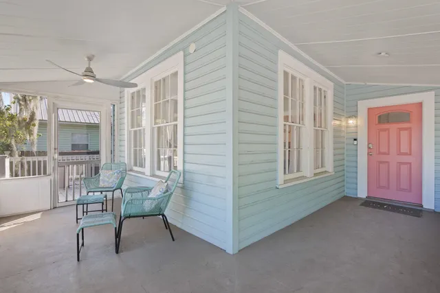 a view of a livingroom with furniture and windows