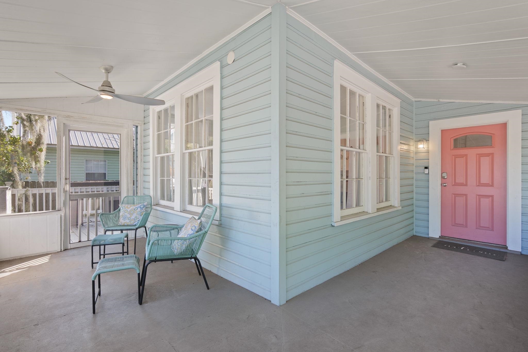 a view of a livingroom with furniture and windows