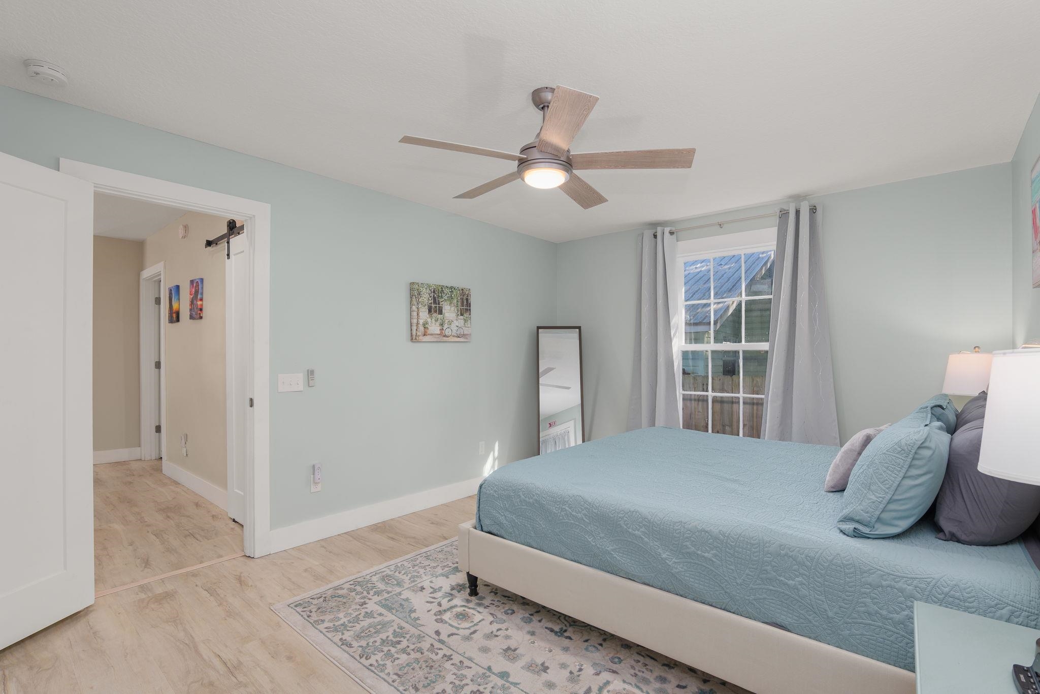 2 Clark Street St. Augustine, FL 32084 - Photo 19 of 39 a bedroom with a large bed and a window
