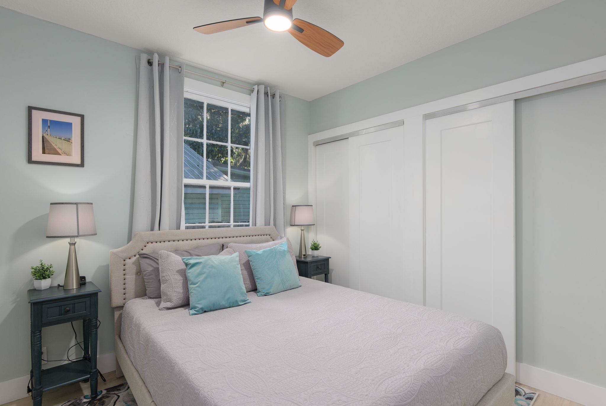 2 Clark Street St. Augustine, FL 32084 - Photo 21 of 39 a bedroom with a bed and a window