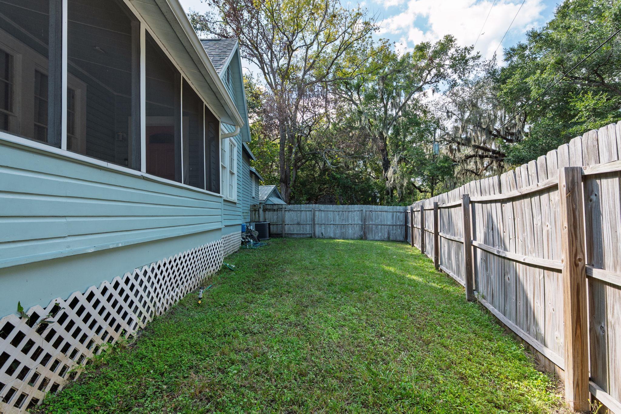 2 Clark Street St. Augustine, FL 32084 - Photo 30 of 39 a view of a backyard with wooden fence