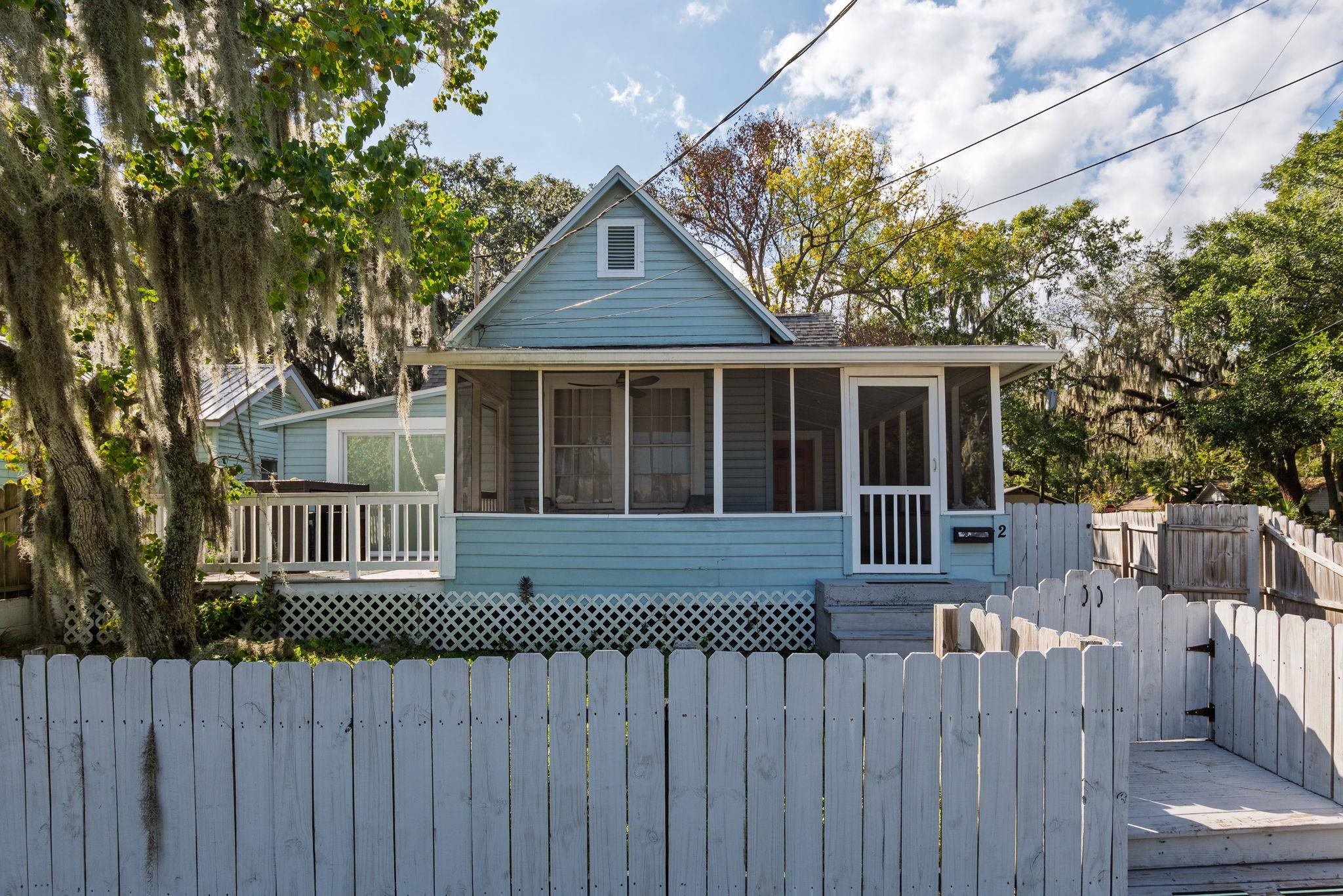 2 Clark Street St. Augustine, FL 32084 - Photo 33 of 39 a front view of a house with a garden