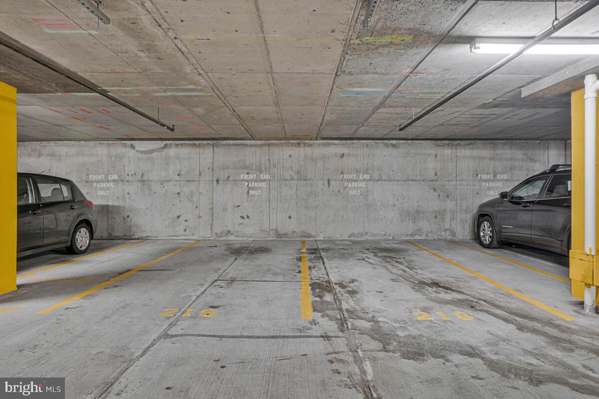 11800 Sunset Hills Road, Unit 514 Reston, VA 20190 - Photo 57 of 57 a view of parking garage with cars