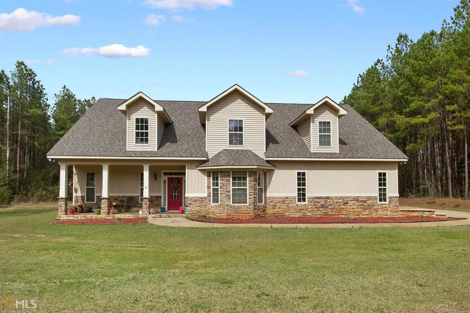 757 Johnson Road Hogansville, GA 30230 - Photo 1 of 1 a front view of a house with garden