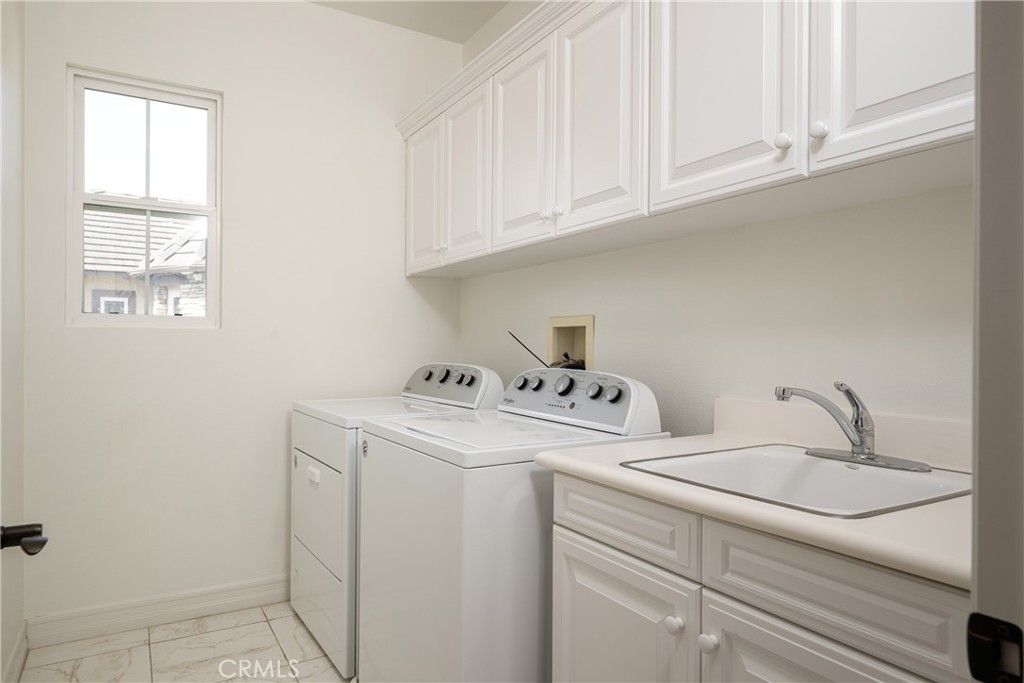 25 Hallcrest Drive Ladera Ranch, CA 92694 - Photo 27 of 40 Upstairs laundry room ~