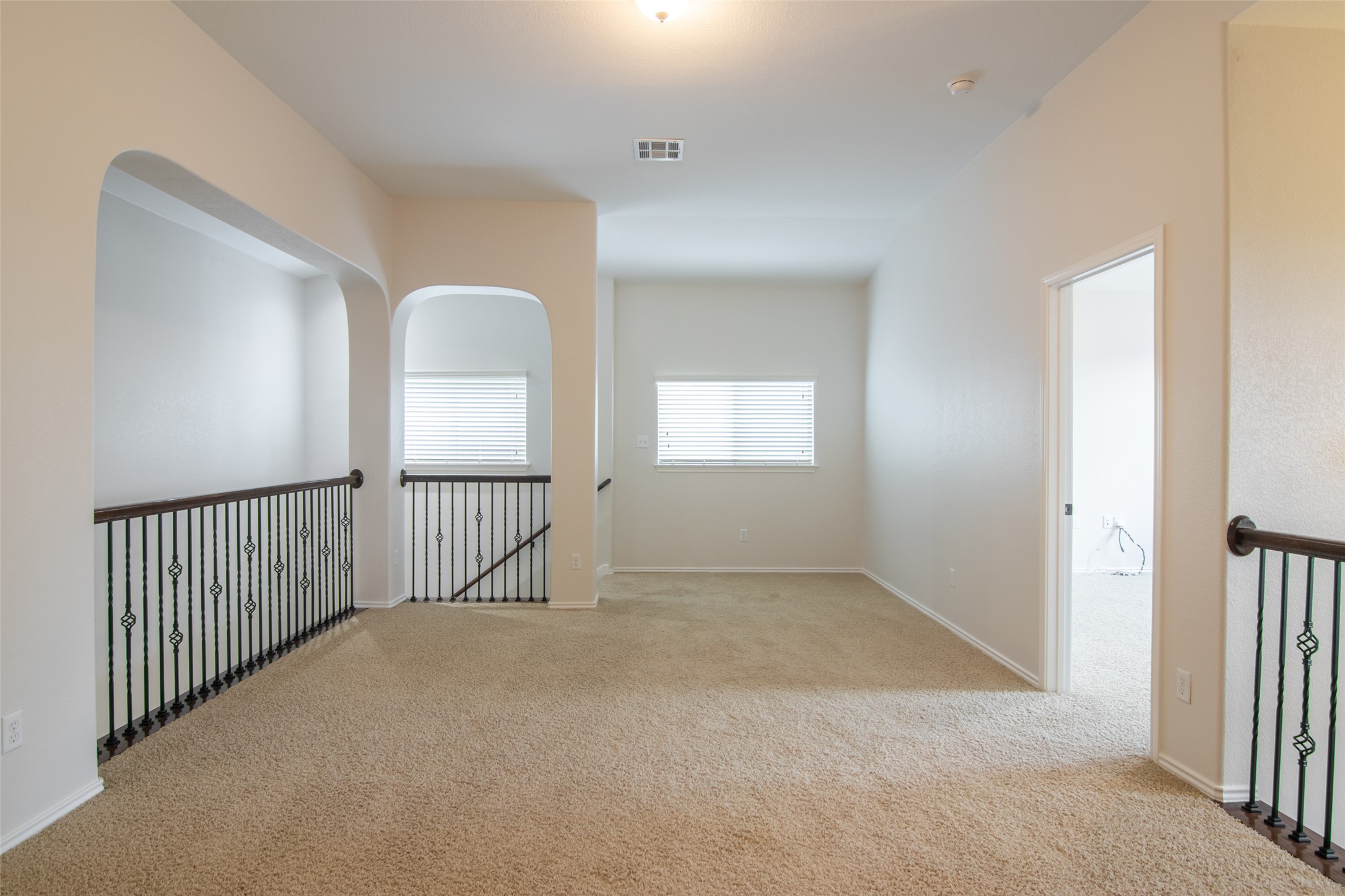 12104 Broten Street Austin, TX 78748 - Photo 22 of 32 A spacious carpeted loft area provides a flexible space for relaxation or recreation.