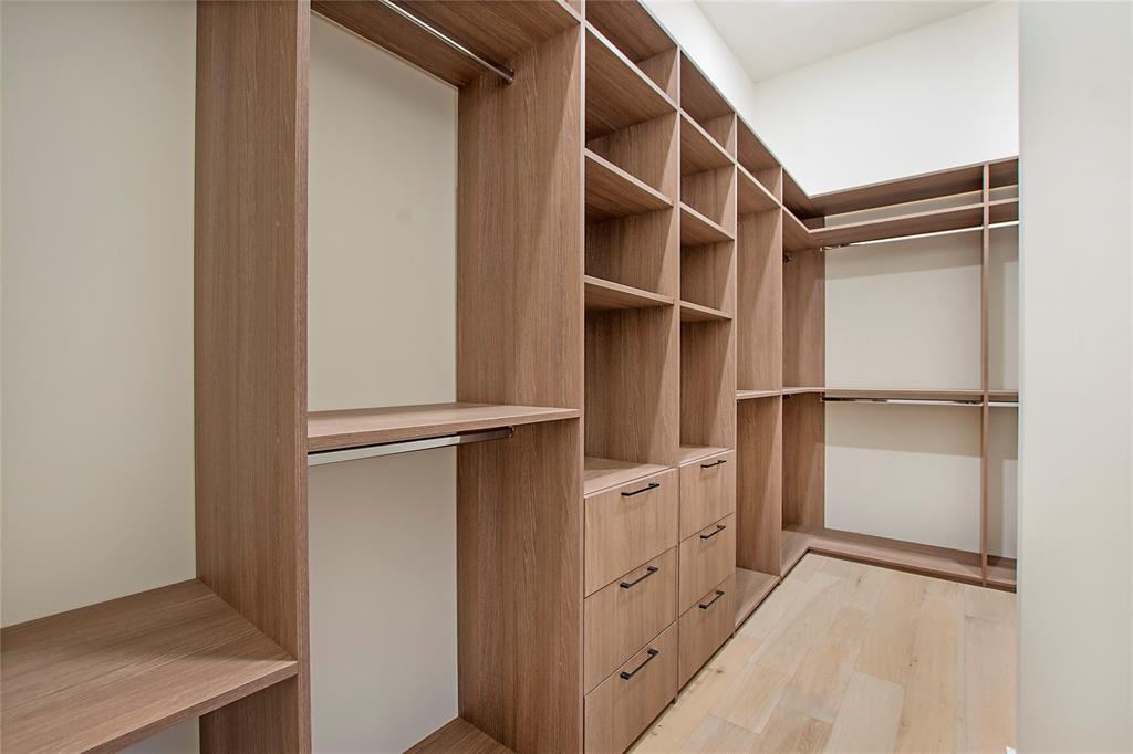 2620 Maple Avenue, Unit 1101 Dallas, TX 75201 - Photo 12 of 39 a view of walk in closet with empty racks
