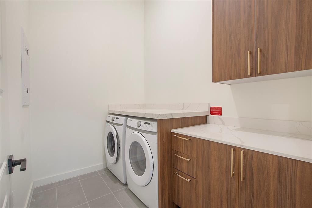 2620 Maple Avenue, Unit 1101 Dallas, TX 75201 - Photo 17 of 39 a utility room with dryer and washer
