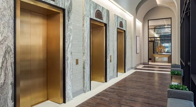 a living room with fireplace furniture and a flat screen tv