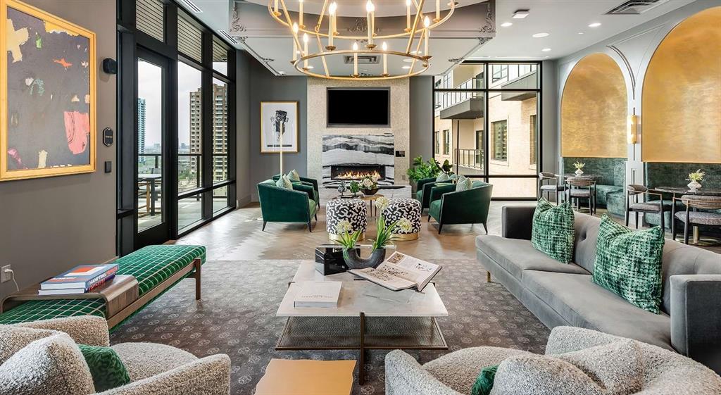 2620 Maple Avenue, Unit 1101 Dallas, TX 75201 - Photo 31 of 39 a living room with fireplace furniture and a flat screen tv