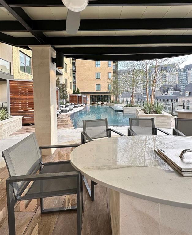 2620 Maple Avenue, Unit 1101 Dallas, TX 75201 - Photo 35 of 39 a dining room with furniture and a large window