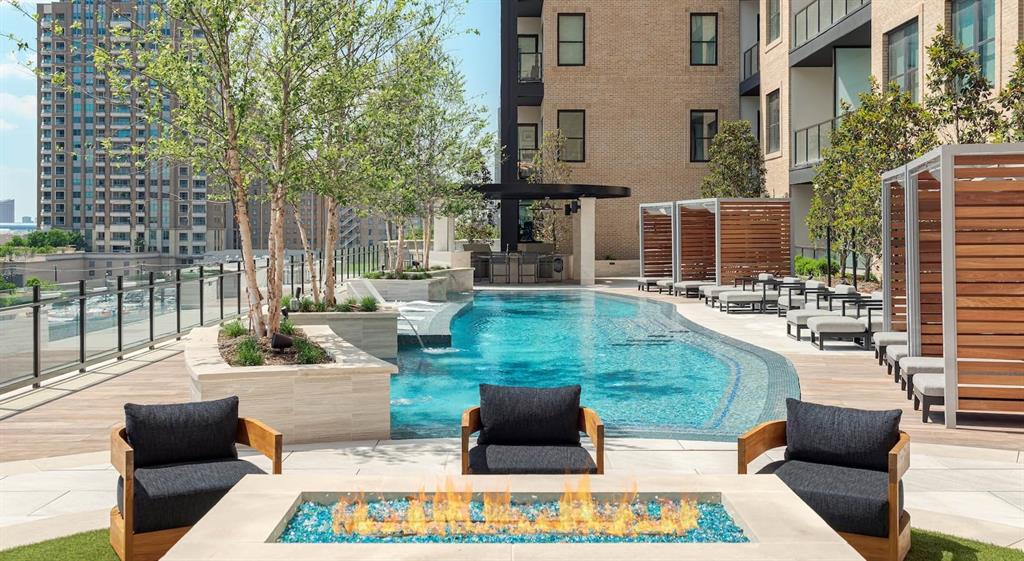 2620 Maple Avenue, Unit 1101 Dallas, TX 75201 - Photo 39 of 39 a view of a patio with couches and table and chairs and potted plants