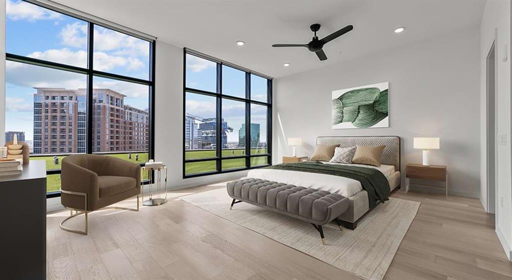 2620 Maple Avenue, Unit 1101 Dallas, TX 75201 - Photo 4 of 39 a spacious bedroom with a bed a couch and a large window